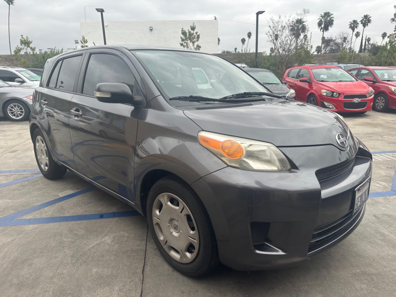 2009 Gray /Black Scion xD 5-Door (JTKKU104X9J) with an 1.8L L4 DOHC16V engine, automatic transmission, located at 30 S. Berkeley Avenue, Pasadena, CA, 91107, (626) 248-7567, 34.145447, -118.109398 - The 2009 Scion XD 4-Door Hatchback is a compact, versatile, and stylish vehicle that offers an exceptional driving experience. Located in the heart of Pasadena, CA, our dealership specializes in a comprehensive selection of used BHPH (Buy Here Pay Here) cars, including the dynamic Scion XD. This veh - Photo #4